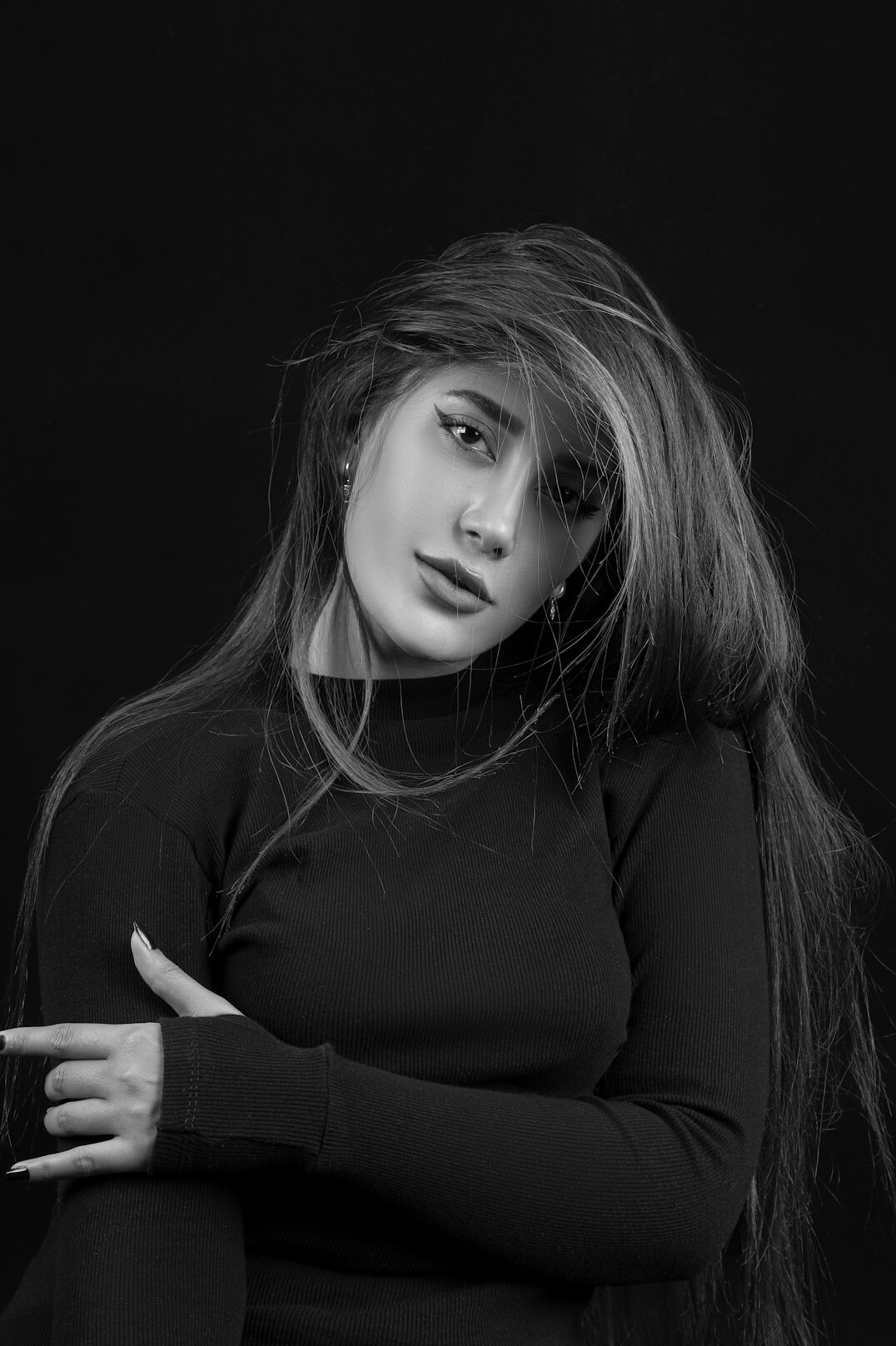 Professional portrait of a woman with long hair